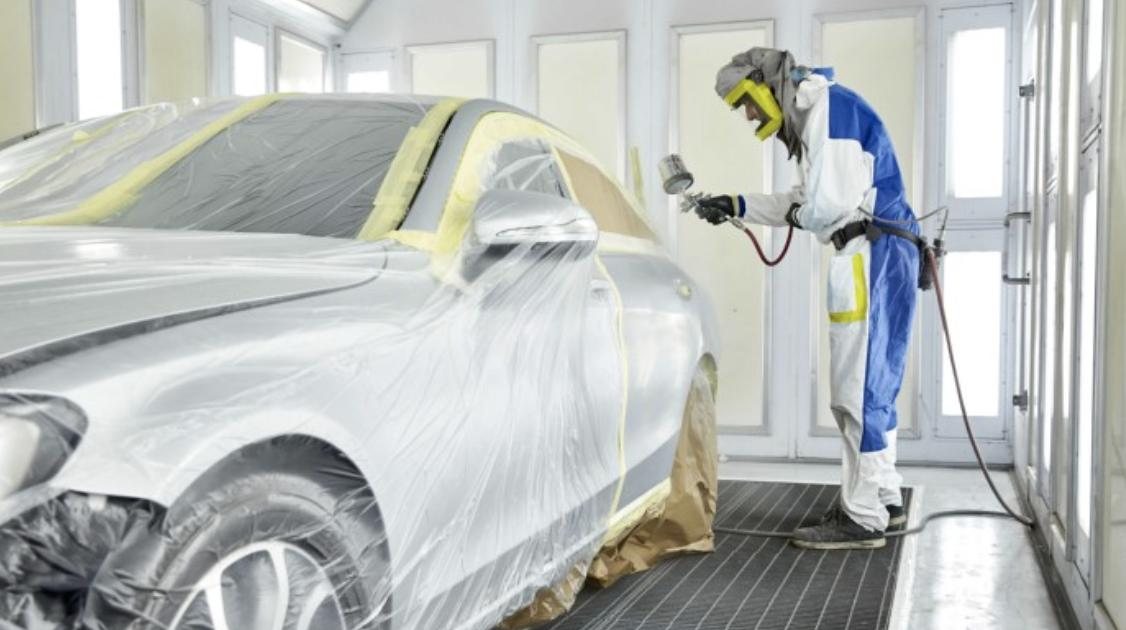 Car being prepared in the spray booth